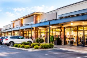 Invest in a feasible operational investment yielding retail shopping centres in a town within the Wi