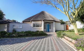 Stunning Guest House For Sale in Plettenberg Bay located within walking distance of the beach