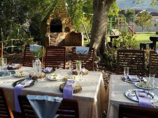 Image of Garden Cafe in tranquil safe settings with mountain views. Child Safe. Pet Friendly