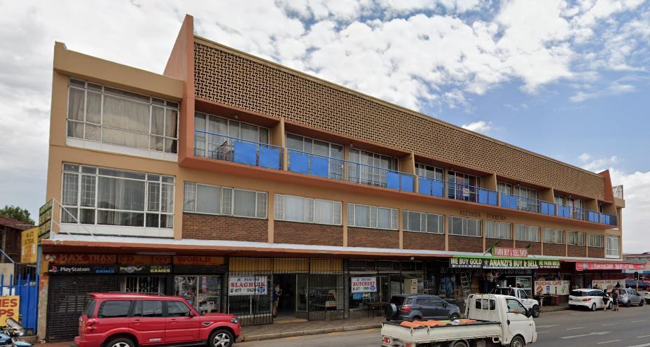 Commercial building with long term retail tenants on Ontdekkers Rd for Sale