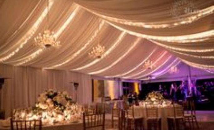 Specialists in draping, fairy lights, naked bulbs and chandeliers in the styling of events.