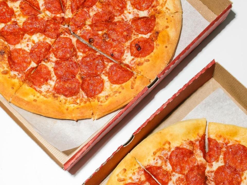 Established fast food eatery offering crave-worthy pizzas and burgers with strong local brand 